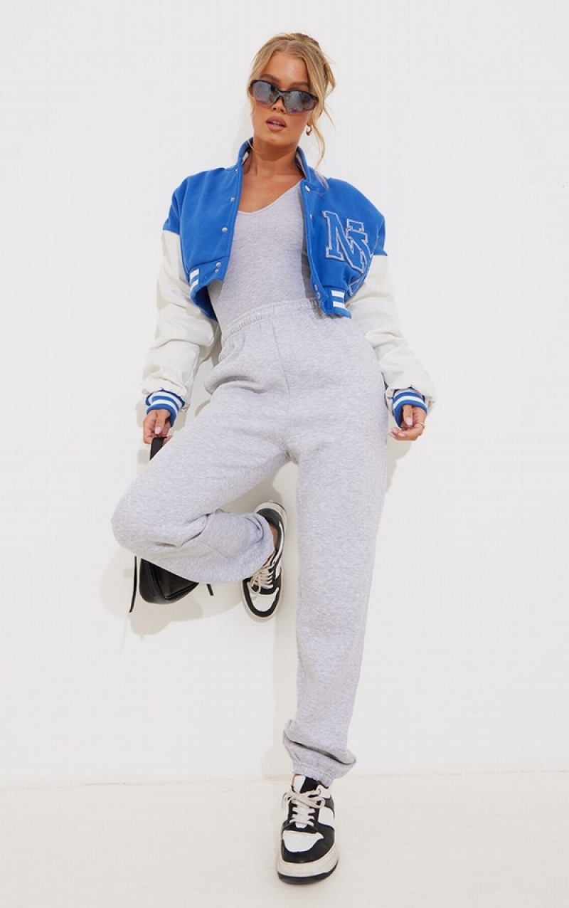 Geci Pretty Little Thing Grafice Front Faux Piele Ruched Sleeve Cropped Bomber Albastri | VZRK90412